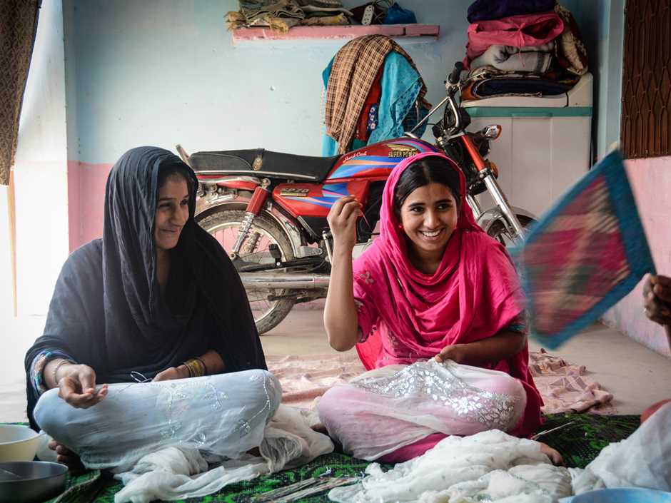 women sewing, Pakistan