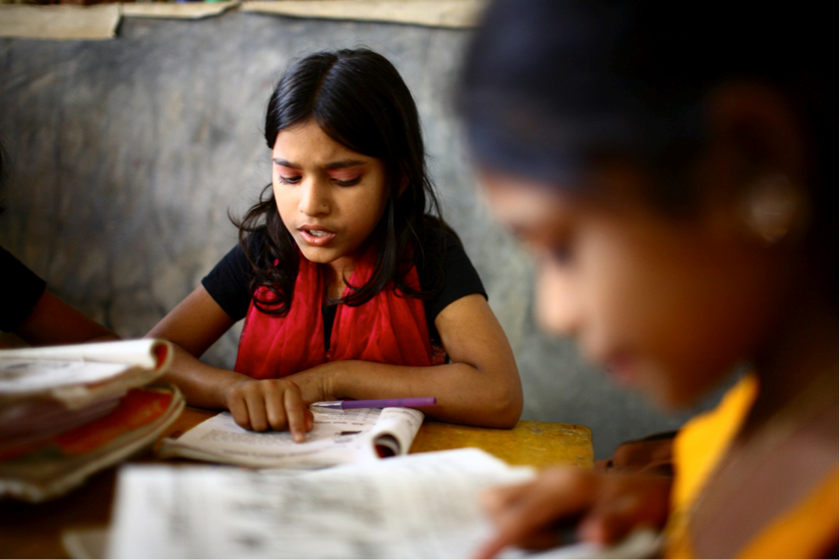 girl reading in class